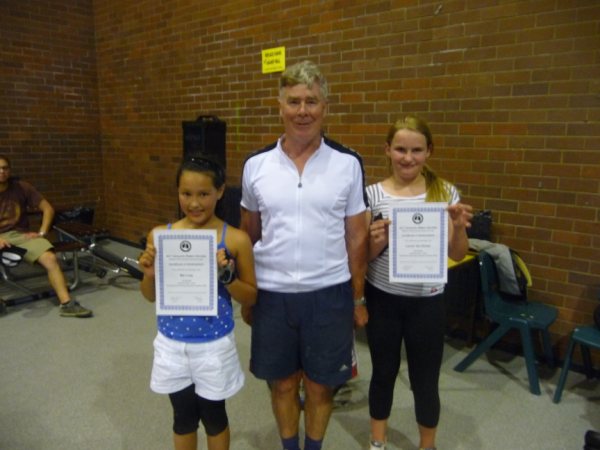 Photograph shows Mai and Lauren with their certificates from Rod